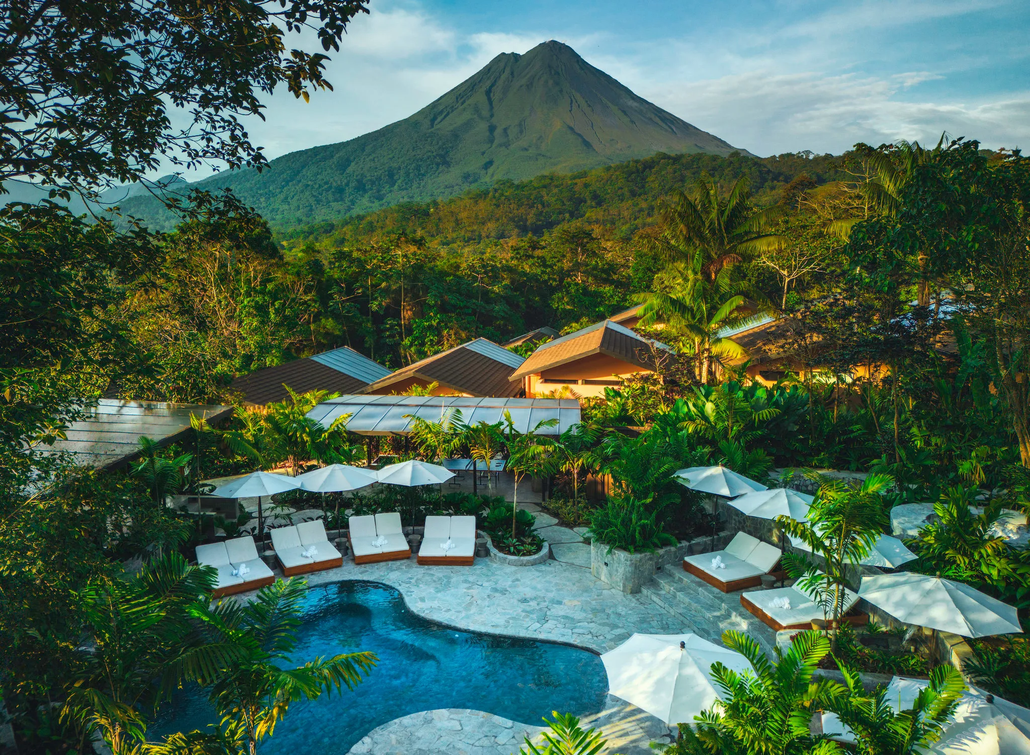 A rainforest lodge pool beneath Arenal Volcano, La Fortuna